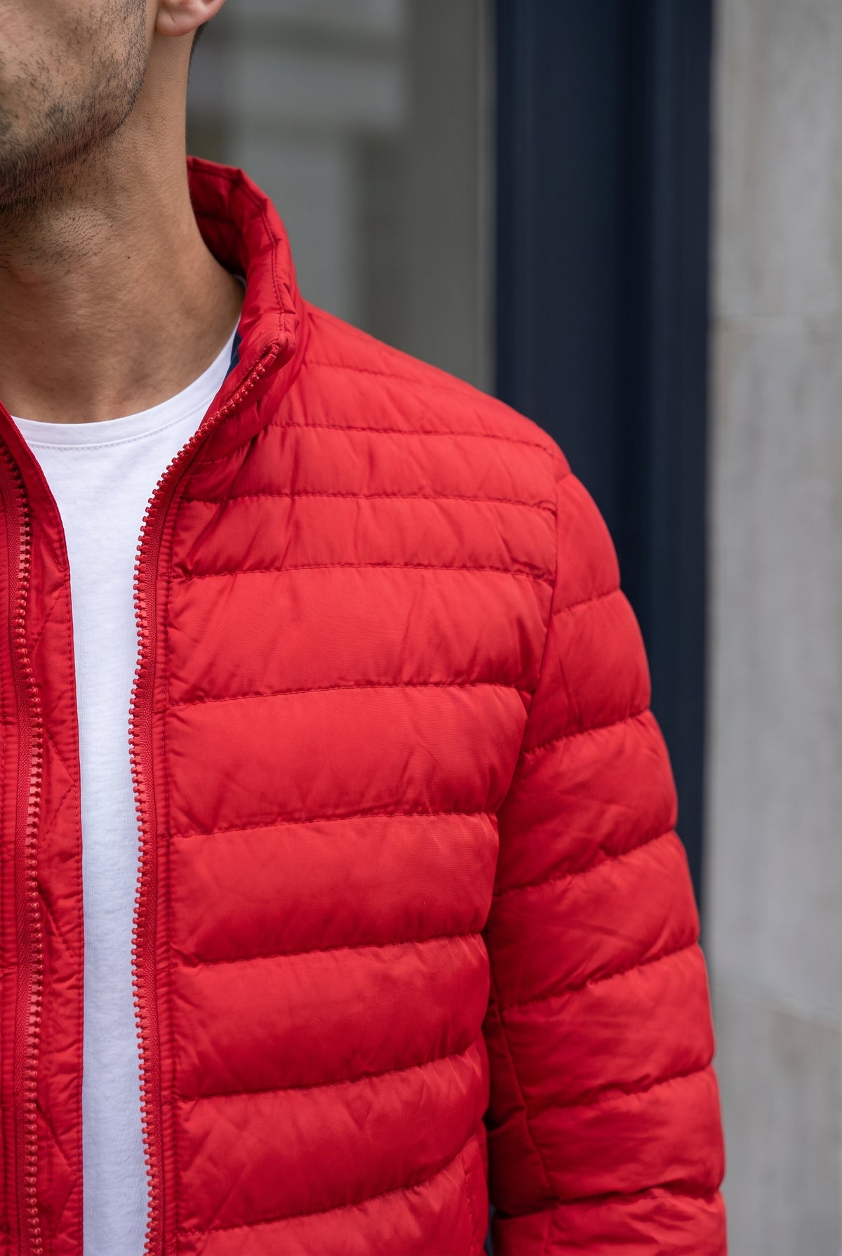 Quilted Puffer Jacket in Red — studio detail
