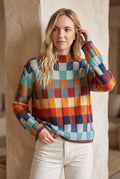 Checkered Merino Turtleneck Sweater in Solid — studio front