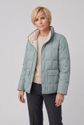 Women's Reversible Quilted Jacket with Stand Collar in Teal — studio front