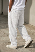 Corduroy Wide-Leg Pants in White — studio front