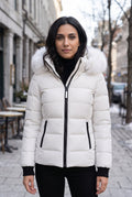Hooded Faux-Fur Puffer Jacket in White — studio front