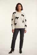 White Ivory Crewneck Sweater with Black Bow Motif - Knitted sweater - Photo 1