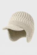 Rib Knit Earflap Beanie in White — studio front