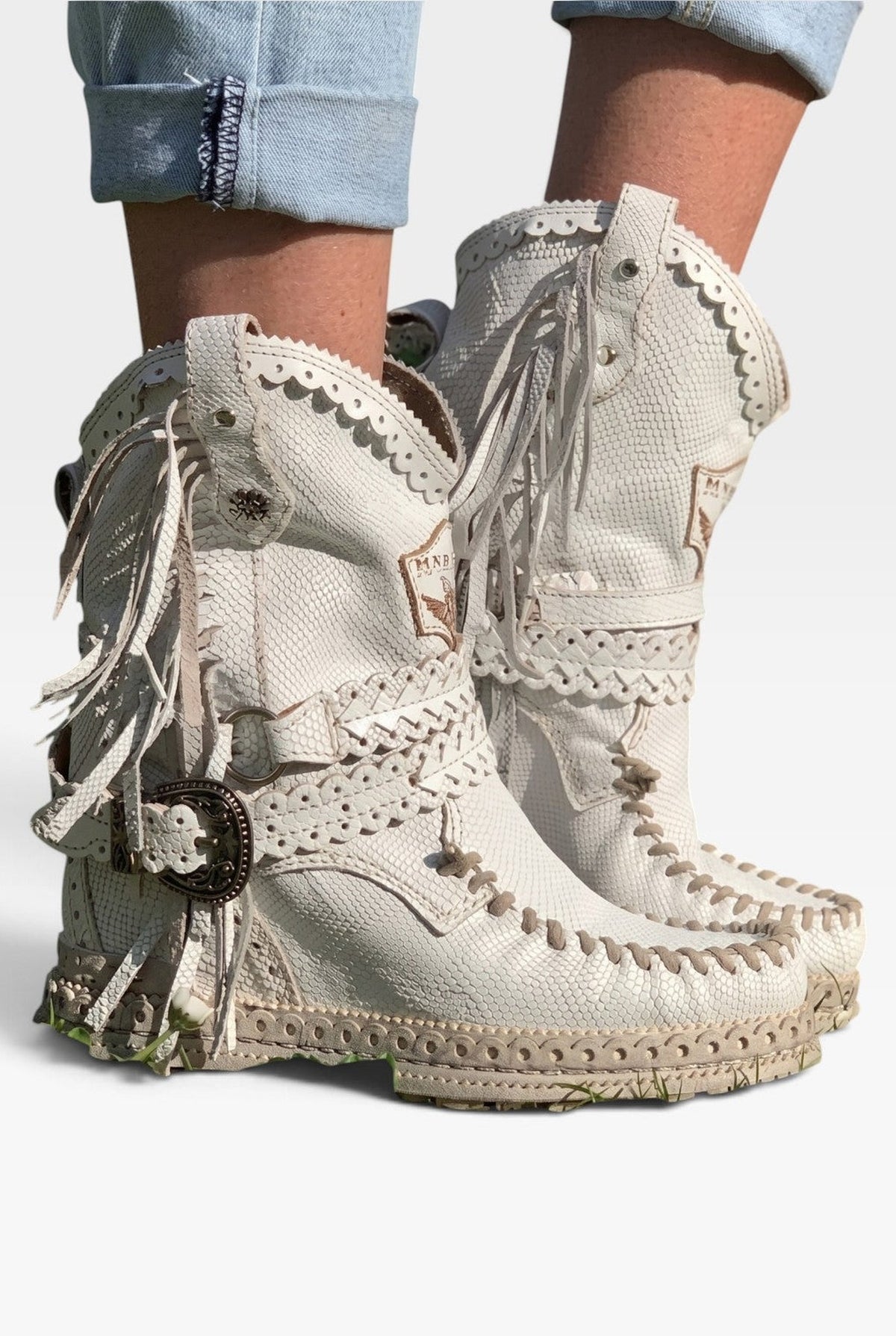Suede Fringe Ankle Boots in White — front view