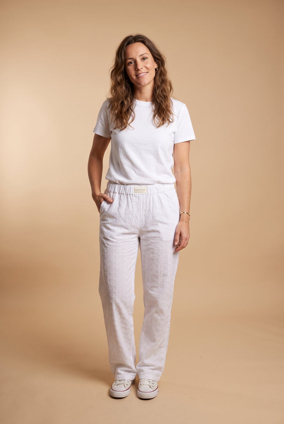 Women's Pants Relaxed Fit in White — warm beige studio full body