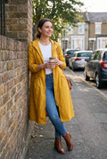 Women's Raincoat Long Elegant in Yellow — park path