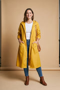 Women's Raincoat Long Elegant in Yellow — studio